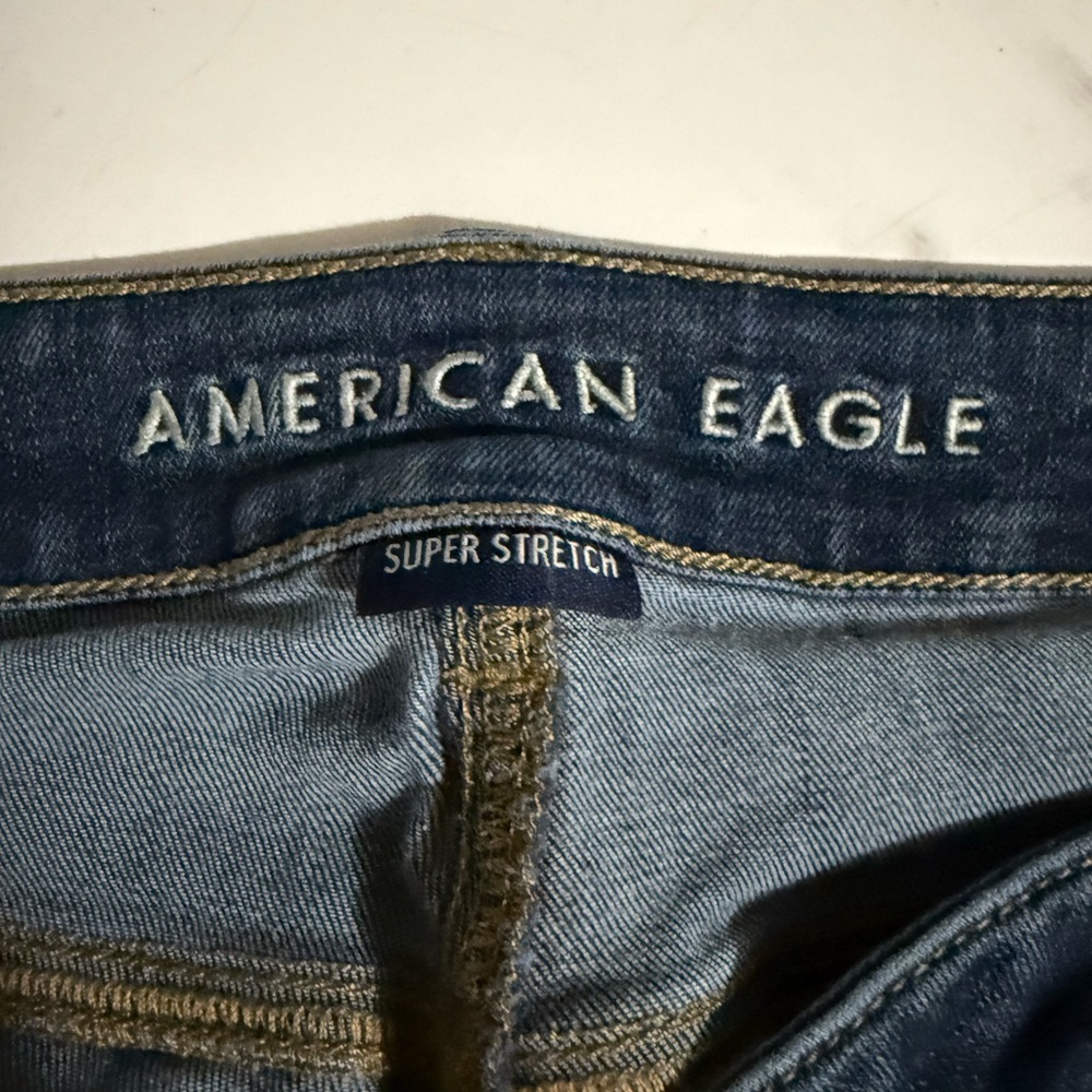 2 pairs of American Eagle Favorite Boyfriend Dark Blue Denim jeans.